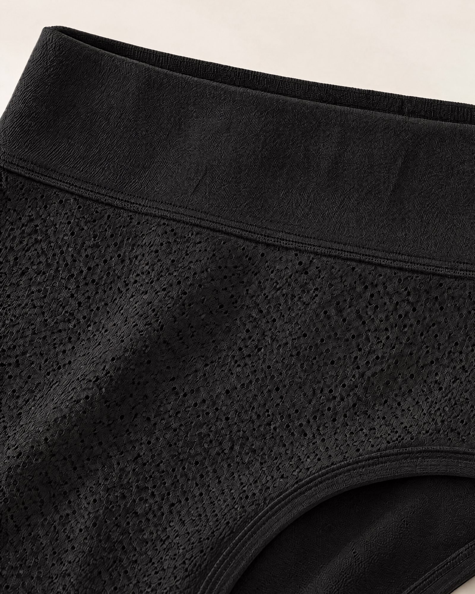 Close-up of the knit and the wide waistband of the High-Waist Absorbent Brief, Black