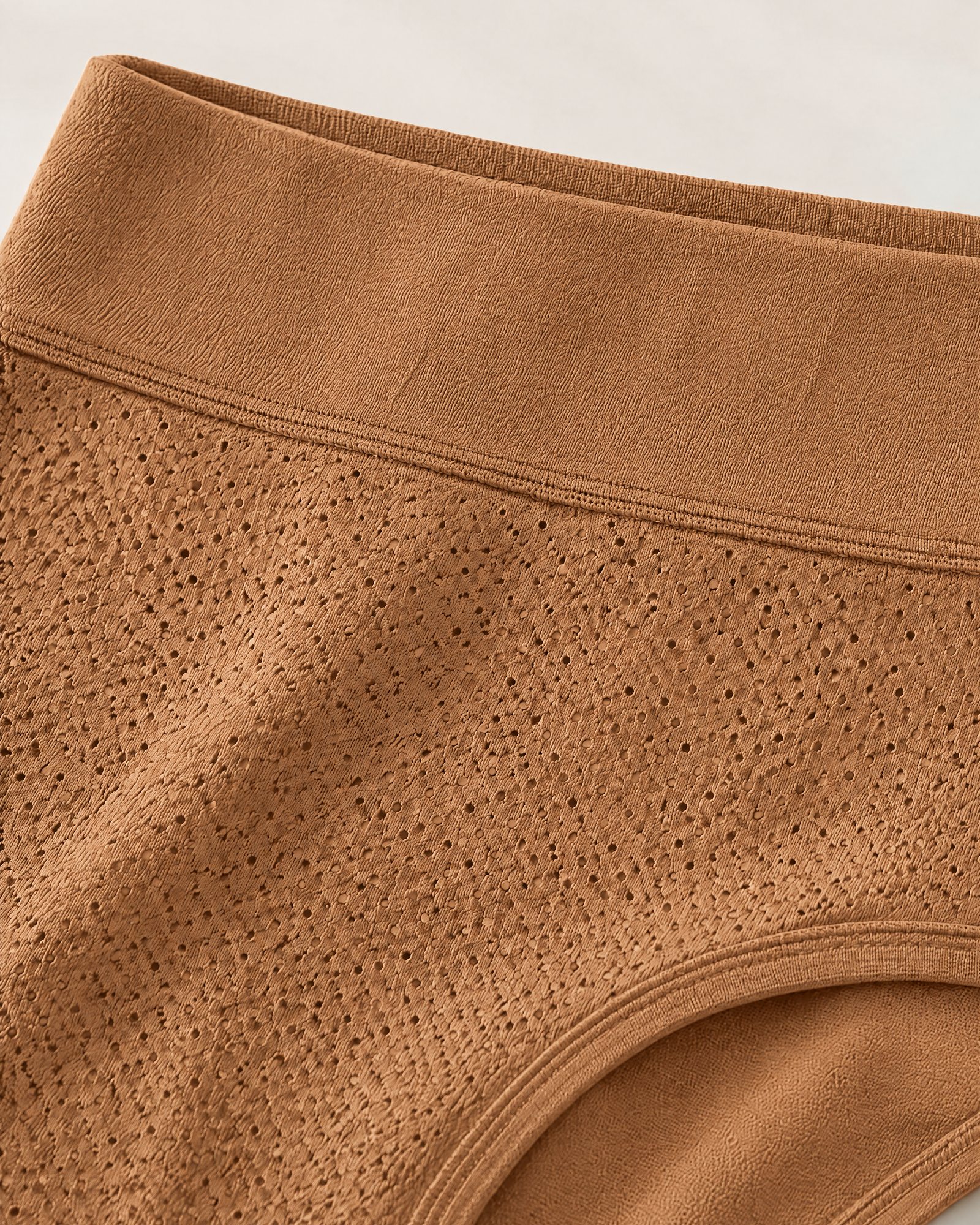 Close-up of the knit and the wide waistband of the High-Waist Absorbent Brief, Caramel
