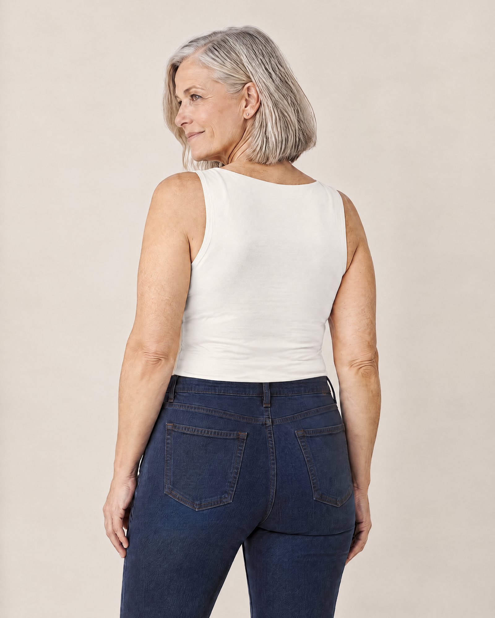 The Comfort Tank, White from the back: a smooth back and wide straps