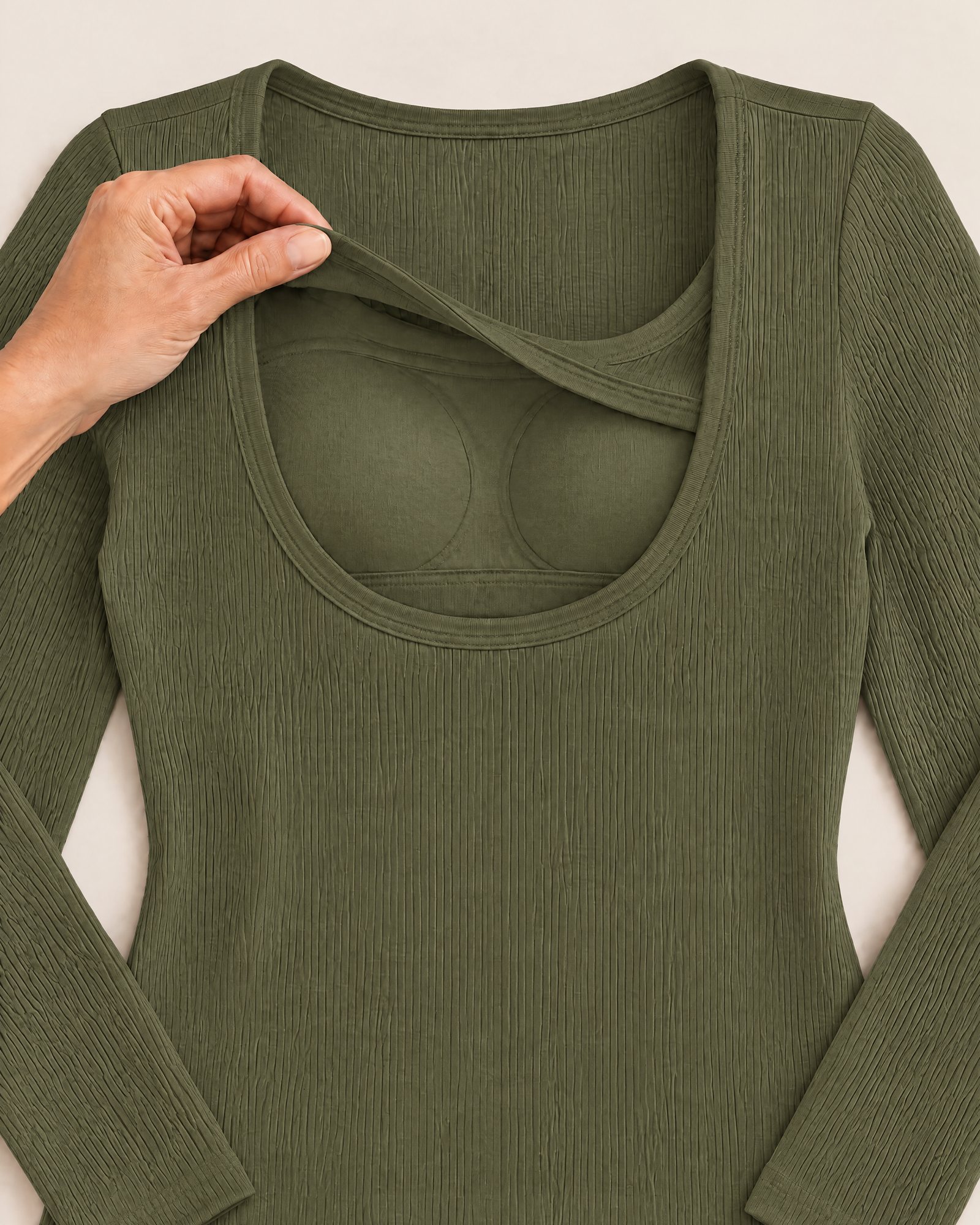 Inside the Ribbed Long-Sleeve Top, Olive: the inner layer and a padded cup