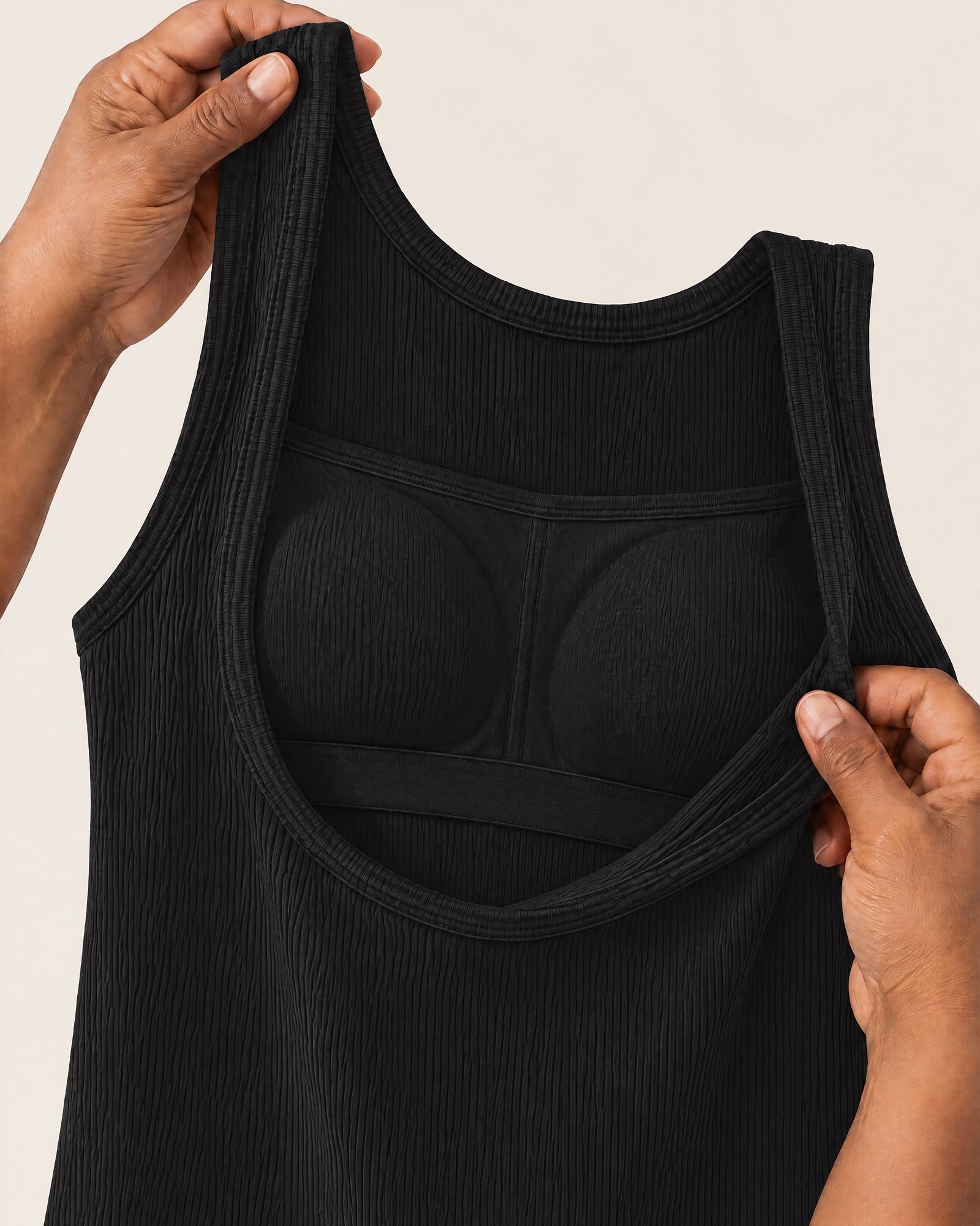 Inside the Ribbed Cotton Tank, Black: the elastic shelf band under the bust