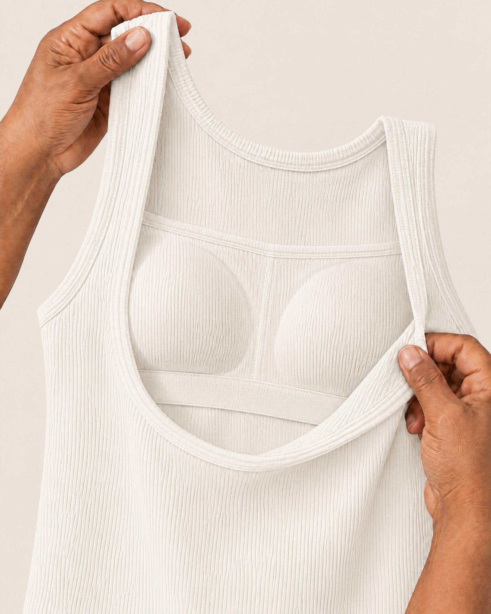 Inside the Ribbed Cotton Tank, White: the elastic shelf band under the bust